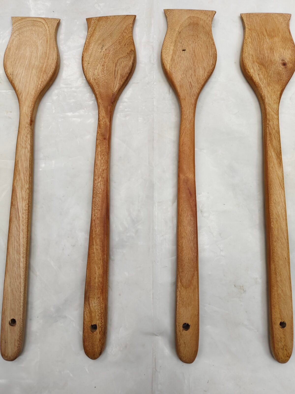Handmade wooden cooking spoons are safe and scratch-free for utensils. - Image 1