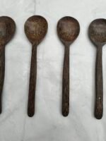Small wooden spoons of salt - and spice spoons