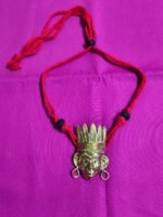 Handcrafted Dokra Tribal Face Pendant Necklace – Red Thread Design