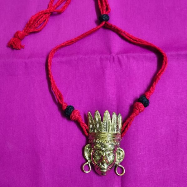 Handcrafted Dokra Tribal Face Pendant Necklace – Red Thread Design