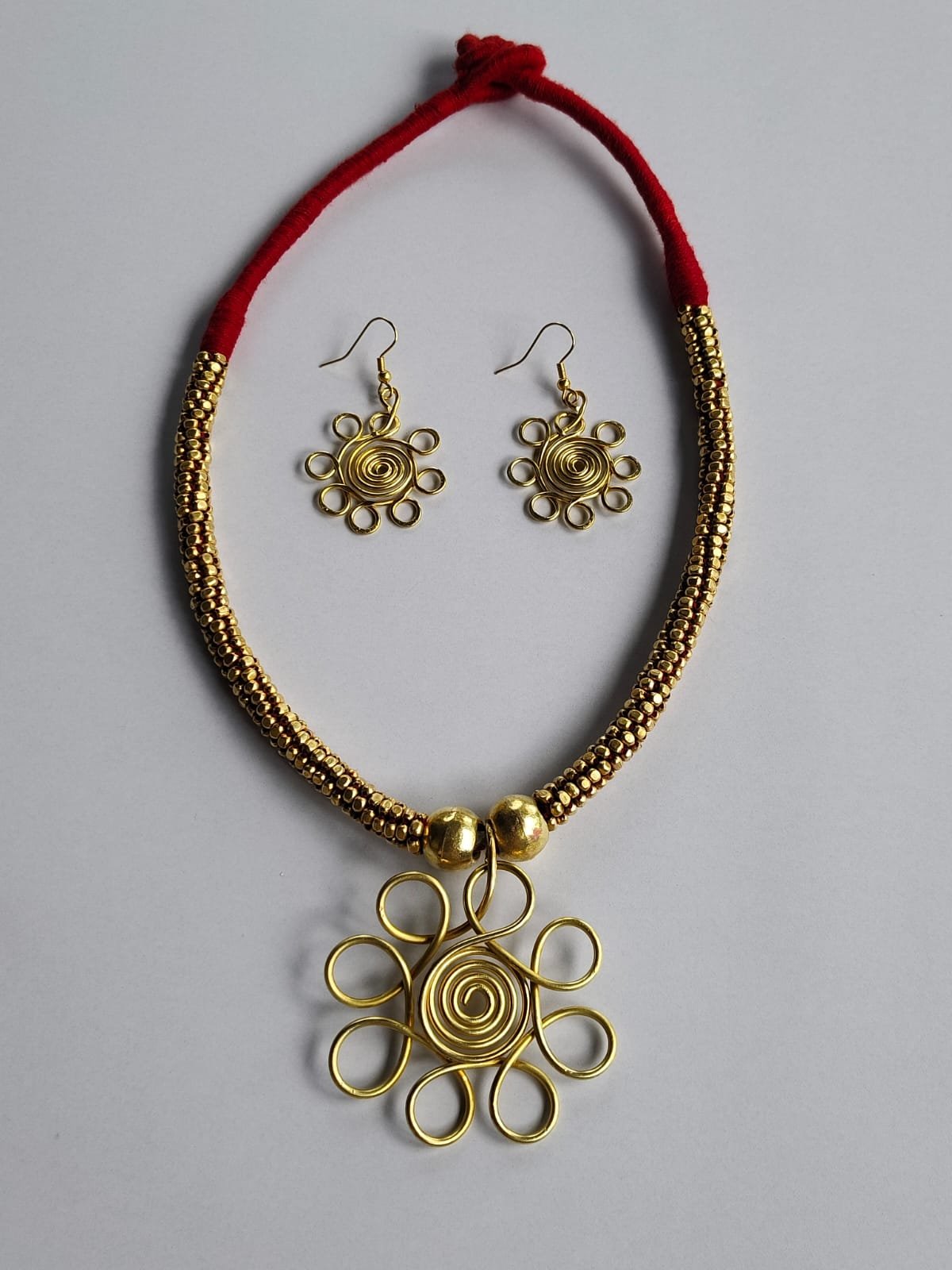 WhatsApp Image 2025-10-20 at 16.37.50_3283aa59 Handcrafted Dokra Brass Floral Pendant Necklace Set - Image 5