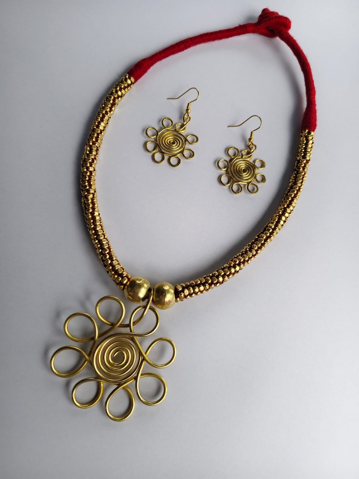 WhatsApp Image 2025-10-20 at 16.37.51_f2038757 Handcrafted Dokra Brass Floral Pendant Necklace Set - Image 3