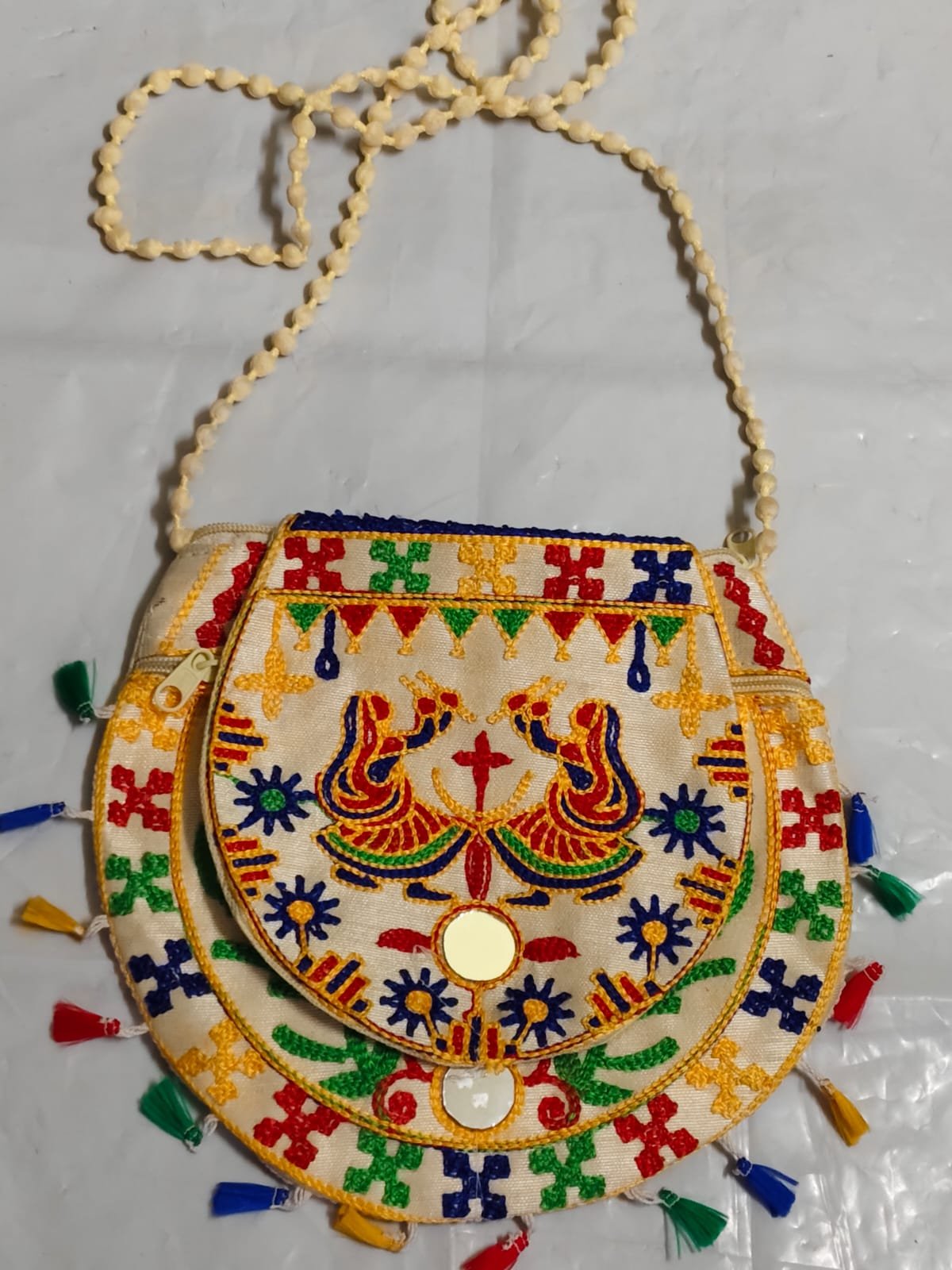 WhatsApp Image 2025-08-24 at 20.52.47_15028139 Handcrafted Embroidered Sling Bag –  Mirror Work & Tassels - Image 4