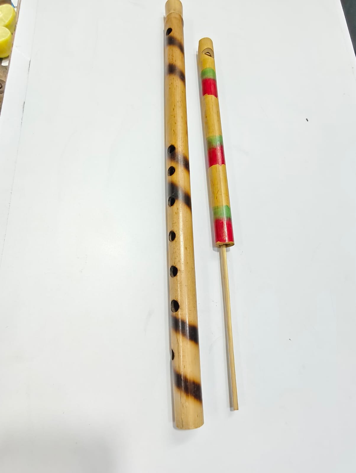 WhatsApp Image 2025-10-17 at 21.42.14_046f4d7f Handcrafted Bamboo Flute (Bansuri) – Natural Burn Finish & Multicolor Rings | Assorted Sizes - Image 3