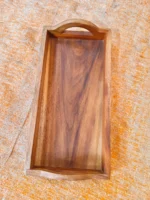 Wooden rectangular wooden plate for party gifts to hold food for the family. Has a handle to hold.