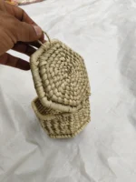 Handmade organic grass jewelry box - the lid is attached to the box.