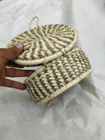 Handmade organic grass jewelry box - The round lid is attached to the box.