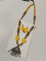 Oxidised Tribal Pendant Necklace Set with Yellow Leaf Beads & Earrings - Image 4