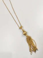 Elegant Gold-Tone Long Necklace with Tassel Pendant - Image 5