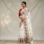 Handcrafted White Cotton Saree with Traditional Printed Motifs - Image 3