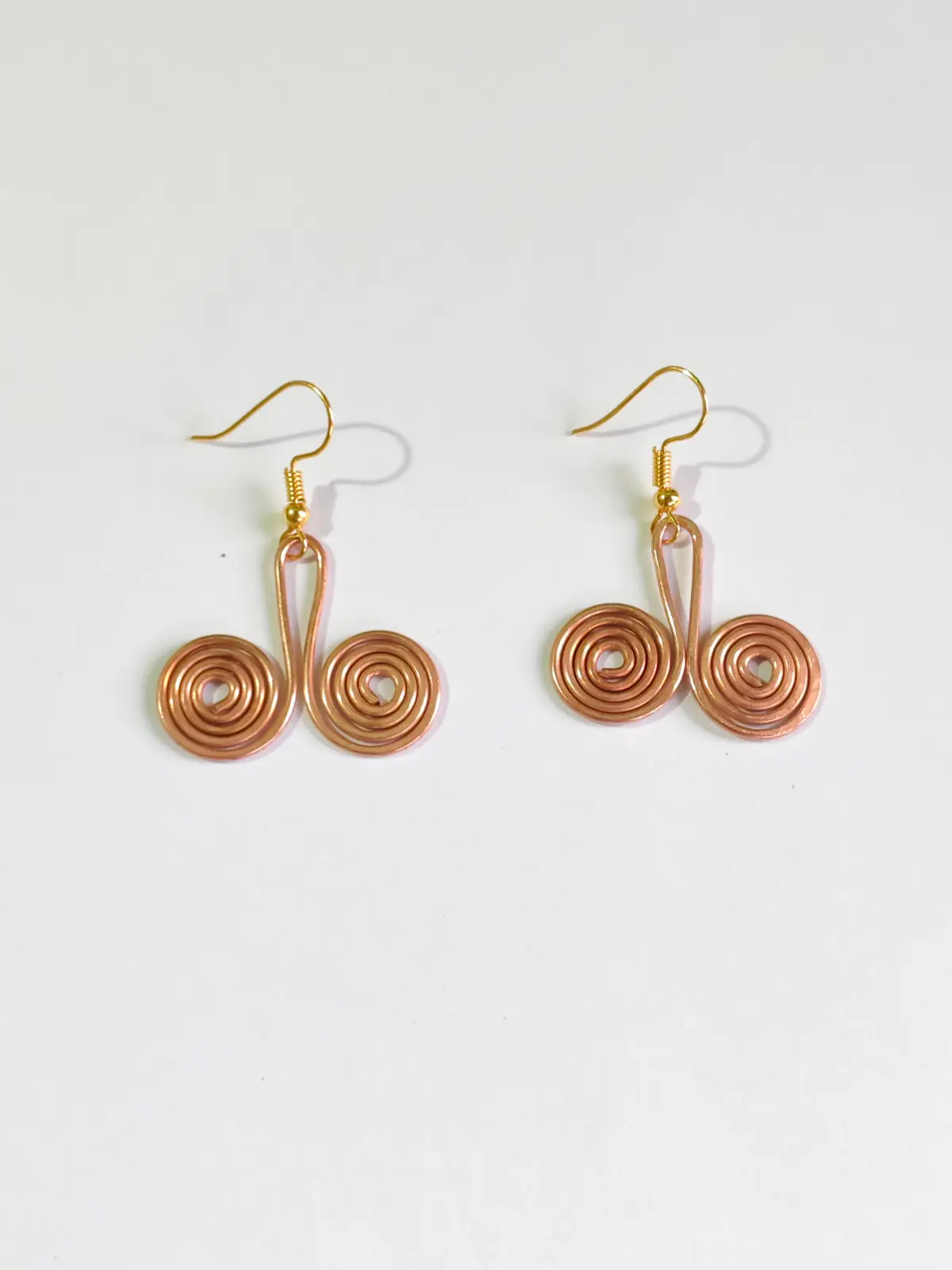 1000896502.webp Handmade: Artistic Pure Copper Spiral Earrings for Women - Image 1