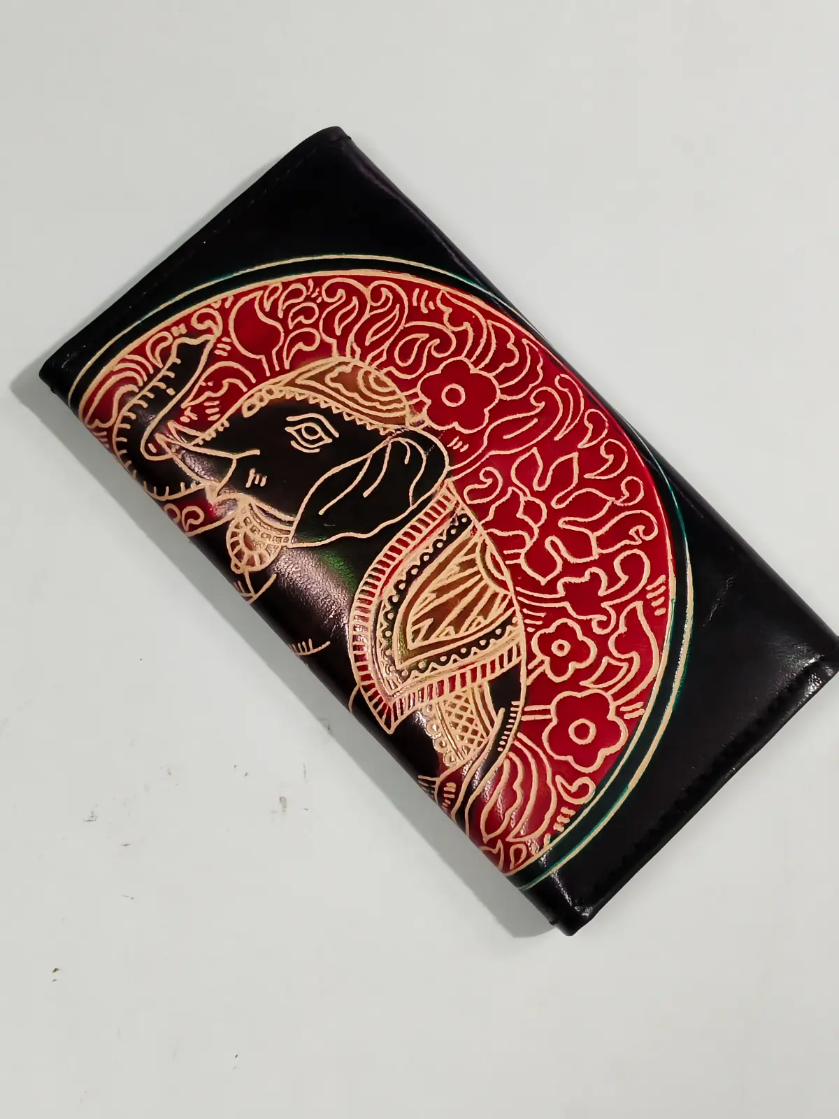 1000903457.webp Handcrafted Black Leather Wallet โ Embossed Elephant Motif - Image 1