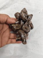 Handmade terracotta Ganesha idol – musical ensemble and Tiger's Eye.