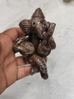 Handmade terracotta Ganesha idol – musical ensemble and Tiger's Eye. - Image 2