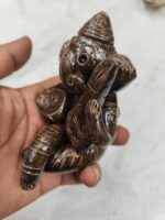 Handmade terracotta Ganesha idol – musical ensemble and Tiger's Eye. - Image 4