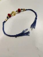 Handmade Dokra brass Rakhi – traditional festival thread (blue) - Image 3