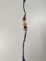 Handmade Dokra brass Rakhi – traditional festival thread (blue) - Image 4