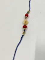 Handmade Dokra brass Rakhi – traditional festival thread (blue) - Image 2