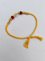 Handmade Dokra brass Rakhi – traditional festival thread (Yellow) - Image 2