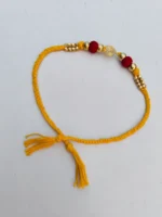 Handmade Dokra brass Rakhi – traditional festival thread (Yellow) - Image 3