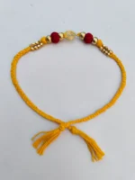 Handmade Dokra brass Rakhi – traditional festival thread (Yellow)