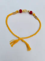 Handmade Dokra brass Rakhi – traditional festival thread (Yellow) - Image 4