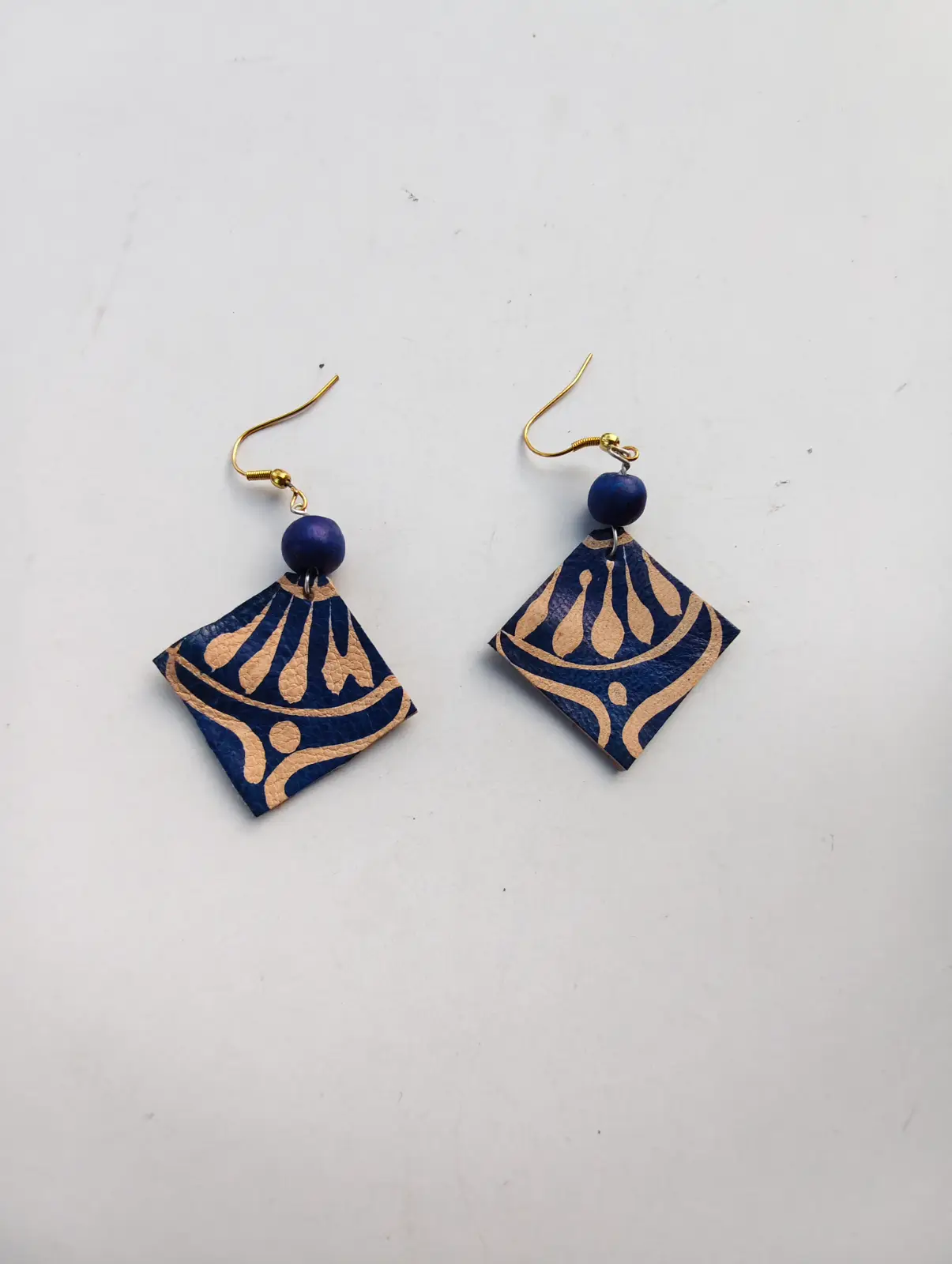 1001023226.webp Handmade: Leather Earrings with Bead Accent - Image 1