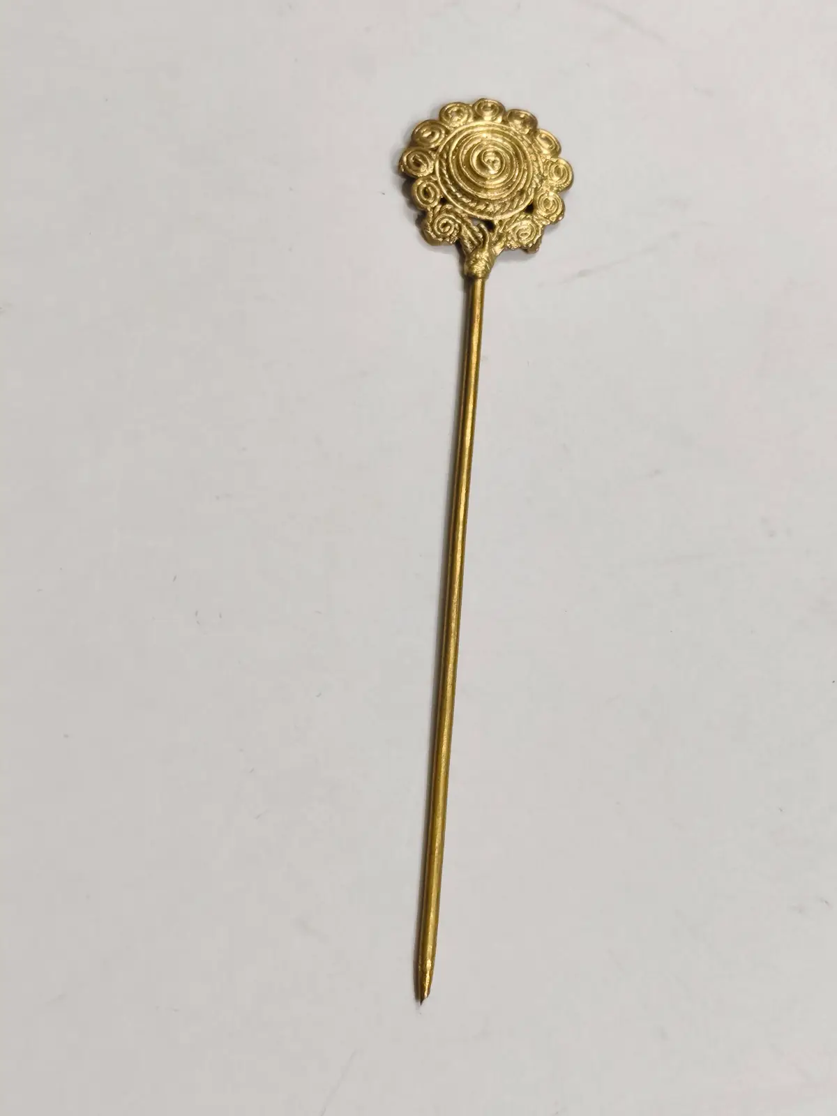 1001147922.webp Handcrafted Dokra Brass Hair Pin – Spiral Circular Filigree Motif - Image 1