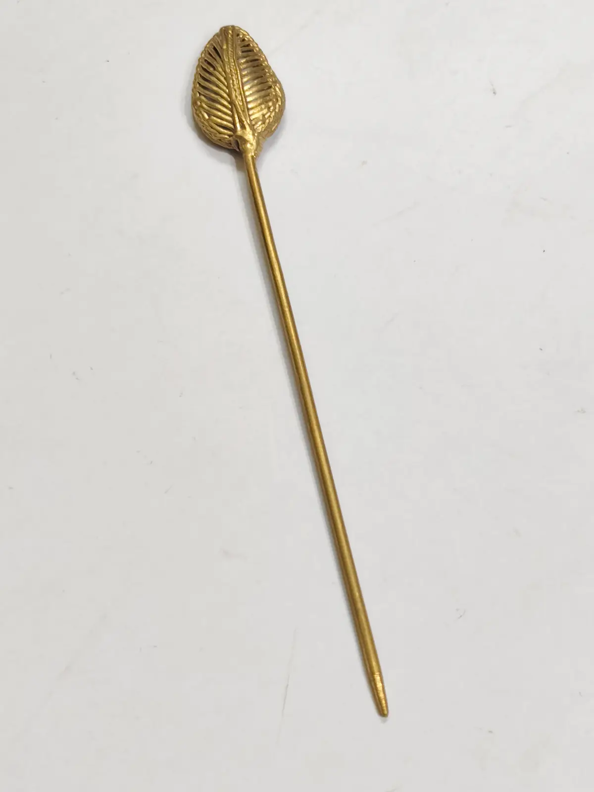 1001147935.webp Handcrafted Dokra Brass Hair Pin – Leaf Vein Motif - Image 1