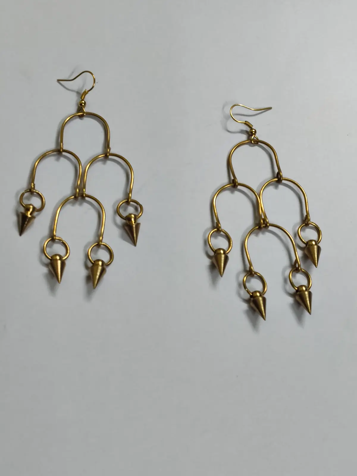 1001164073.webp Handcrafted Brass Earrings – Cascading Cone Design - Image 1