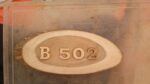 House number plaque with carved wooden lettering (B 520)